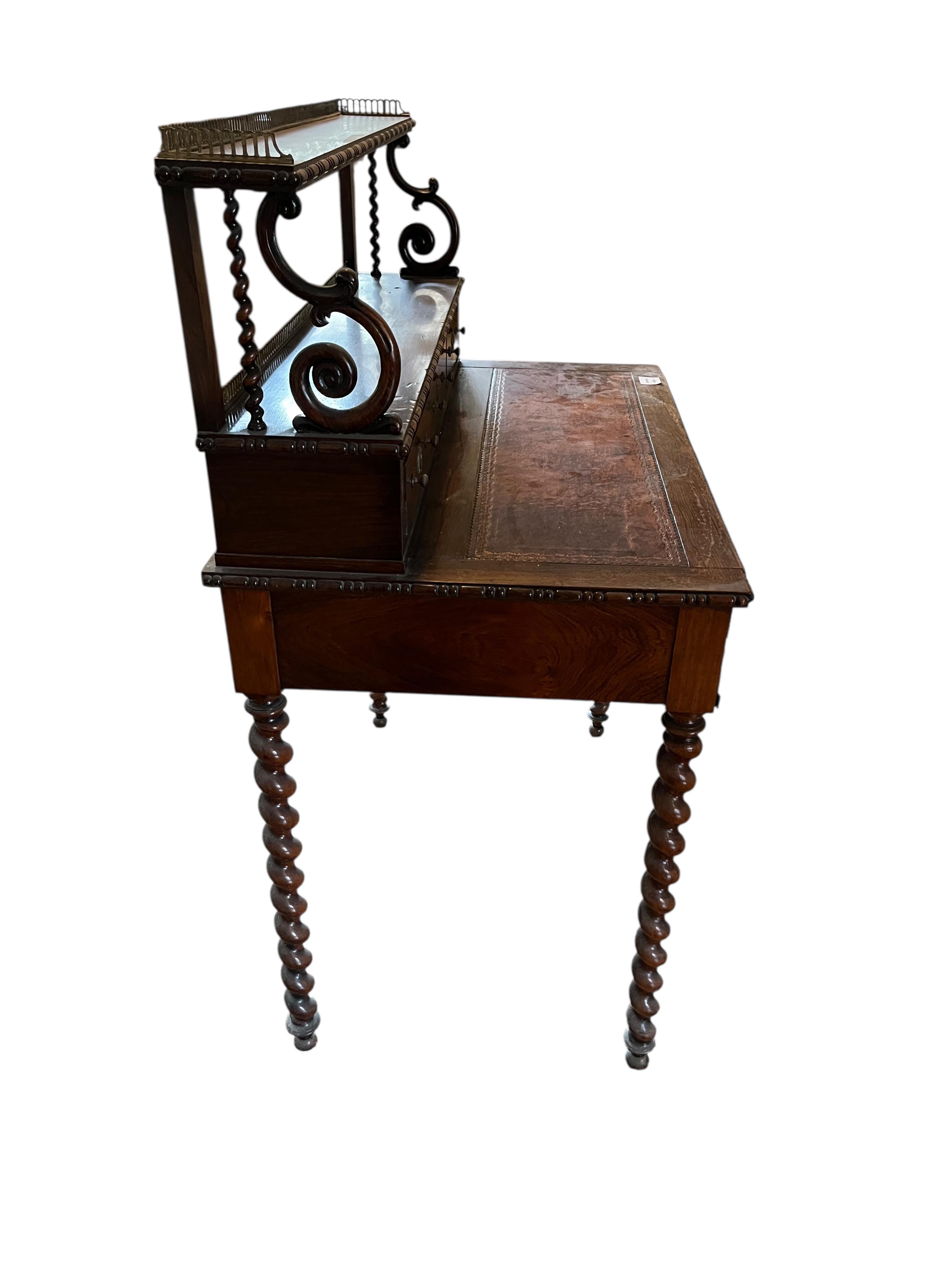A 19th century Continental rosewood bonheur du jour, width 81cm, depth 52cm, height 110cm